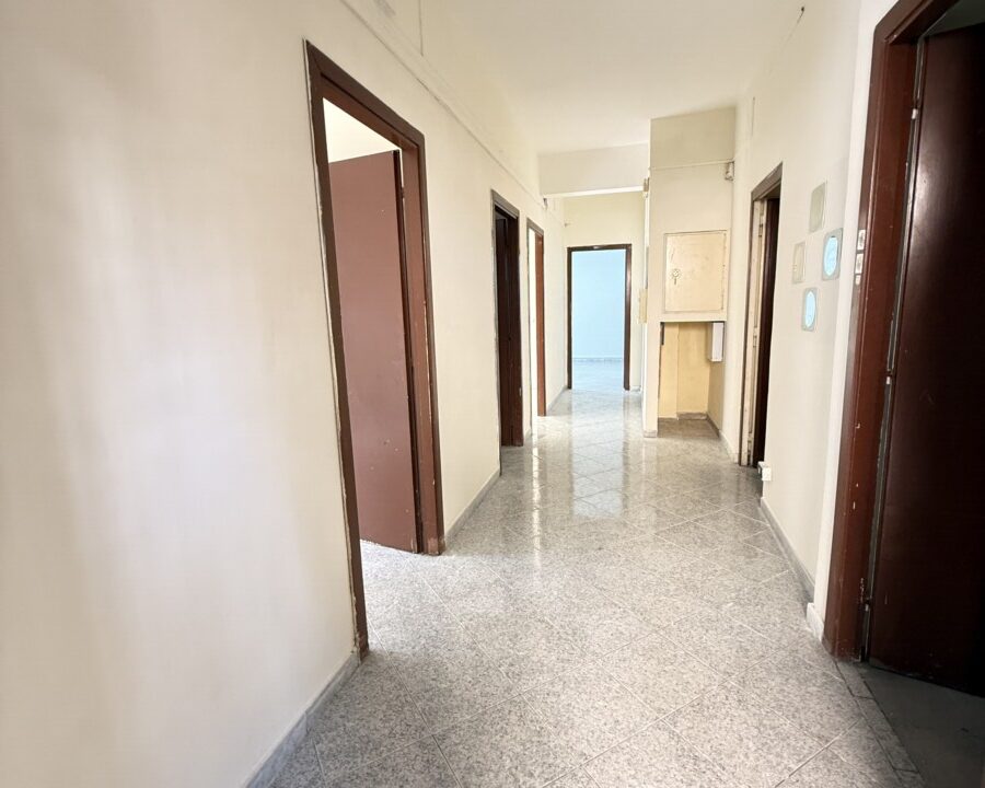 Trilocale in Vendita con Ampio Giardino e Posto Auto