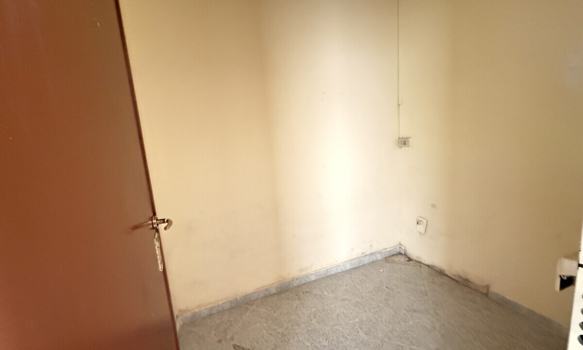 Trilocale in Vendita con Ampio Giardino e Posto Auto